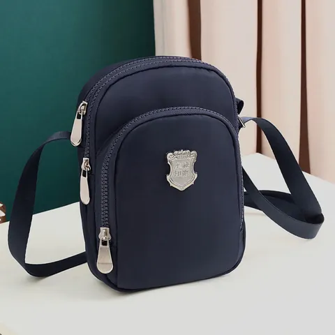 Dames Verticale Nylon Crossbody Mobiele Telefoontas Meerlaagse Rits Waterdichte Kleine Schoudertas Met Metalen Schild Decor