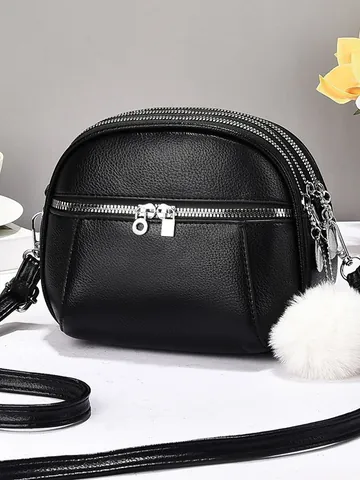 Women Mini Round Crossbody Bag PU Leather Multi Compartment Shoulder Bag With Pom Pom Charm Solid Color Litchi Pattern