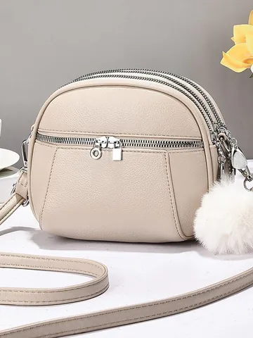 Women Mini Round Crossbody Bag PU Leather Multi Compartment Shoulder Bag With Pom Pom Charm Solid Color Litchi Pattern