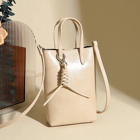 2025 Nuevo Bolso de Bandolera Minimalista para Mujer Cuero de PU Mini Bolso de Mano para Teléfono Móvil Color Sólido Con Nudo Trenzado