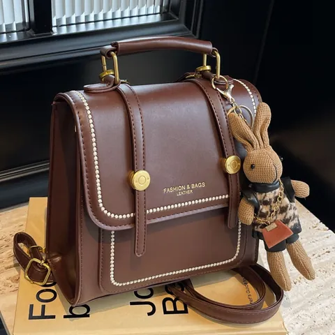 Mochila Mini de Cuero PU Vintage para Mujer Bolso de Mano Bandolera Con Colgante de Conejo Peluche Estilo Francés Retro