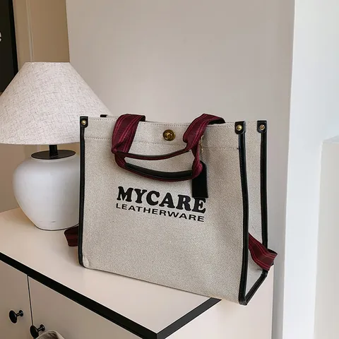 Vintage Canvas Tote Bag With Stripe Ribbon Handle Letter Print Shoulder Crossbody Bag Metal Lock Commuter Fashion Purse For Women