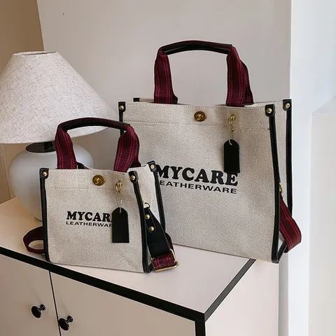Vintage Canvas Tote Bag With Stripe Ribbon Handle Letter Print Shoulder Crossbody Bag Metal Lock Commuter Fashion Purse For Women