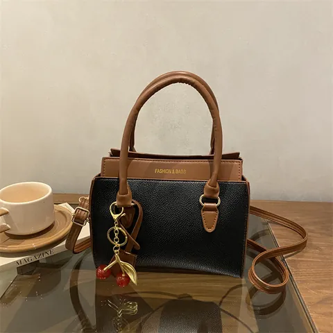 Damen Mode PU Leder Farbblock Tote Tasche Lässig Tägliche Kleine Quadratische Tasche Handtasche Umhängetasche Mit Kirschanhänger