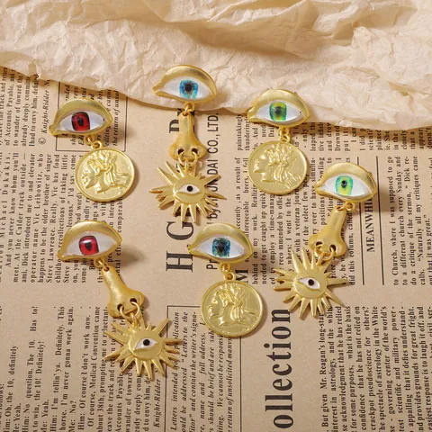 Vintage Asymmetrische Surrealistische Auge Nase Sonne Ohrhänger Vergoldete Legierung Münze Porträt Damen Schmuck