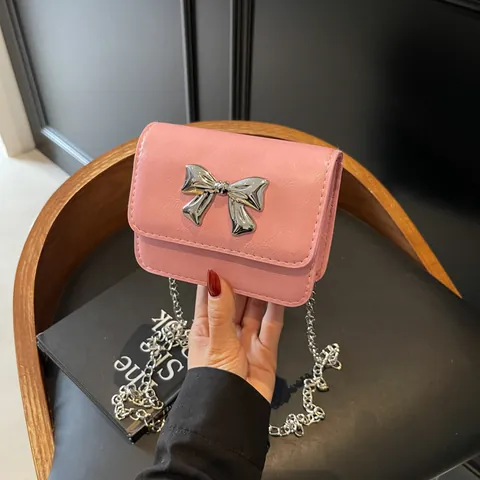 Women's Mini PU Leather Crossbody Bag With Metal Bow Detail And Silver Chain Strap Fashionable Small Square Flip Bag For Daily Use