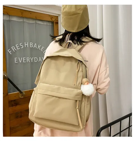 Vrouwen Grote Capaciteit Schoolrugzak Waterdicht Nylon Canvas Effen Kleur Student Boekentas Met Pluche Hanger Koreaanse Stijl