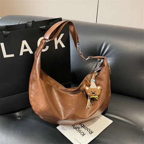 Retro PU Leather Half Moon Hobo Bag Large Capacity Shoulder Bag With Bear Pendant Minimalist Commute Underarm Bag For Women