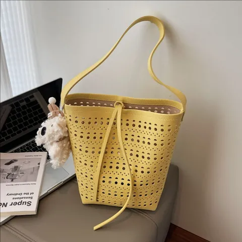 Women Laser Cut Hollow Out Bucket Bag With Plush Pendant PU Leather Single Shoulder Crossbody Handbag Niche Fashion Tote Bag