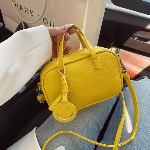Koreanischer Stil Minimalistische PU Kieselstruktur Umhängetasche Für Damen Sommer Neue Kleine Quadratische Handtasche Handytasche Mit Smile-Anhänger