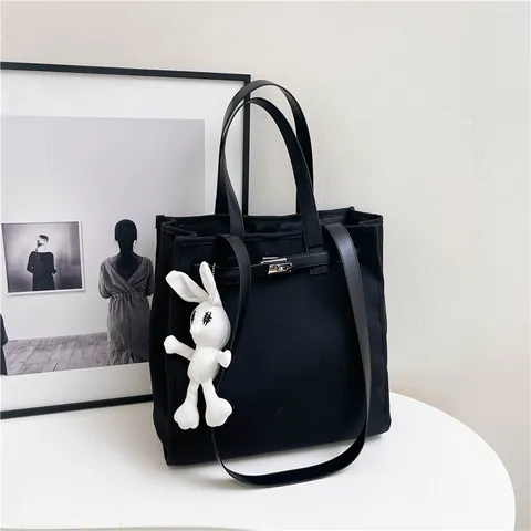 Dames Minimalistische Canvas Tote Tas Contrastkleur Slot Sluiting Schoudertas Grote Capaciteit Handtas Met Schattige Konijnenhanger