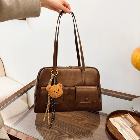 Retro PU Leather Shoulder Bag For Women Multi Pocket Matte Underarm Bag Commuter Tote Handbag With Bear Pendant