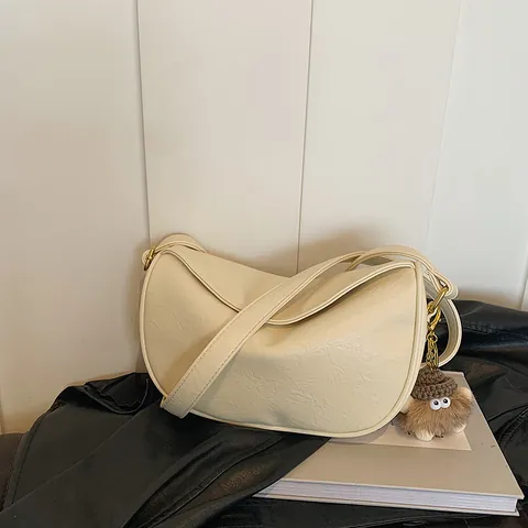 Vintage PU Leather Half Moon Dumpling Bag Minimalist Women Shoulder Crossbody Bag High Sense Daily Commuter Purse With Plush Charm