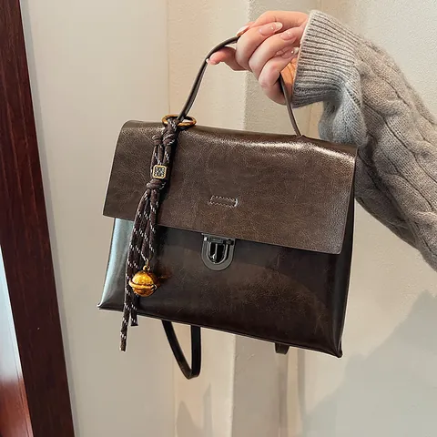 Zaino da Donna in Pelle PU Vintage Borsa a Mano Multifunzionale Con Serratura in Metallo Pendaglio Intrecciato Impermeabile