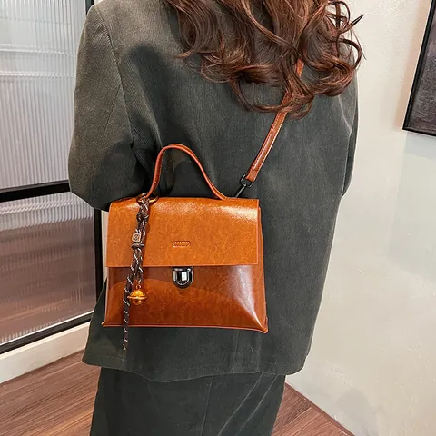 Zaino da Donna in Pelle PU Vintage Borsa a Mano Multifunzionale Con Serratura in Metallo Pendaglio Intrecciato Impermeabile