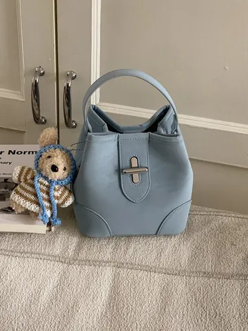 Damen Retro PU Leder Eimertasche Minimalistische Crossbody Umhängetasche Metall Drehverschluss Modische Handtasche Einfarbig