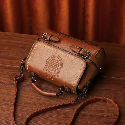 Vintage PU Leather Messenger Bag For Women Retro Satchel Crossbody Handbag With Shield Embossed Logo Adjustable Strap