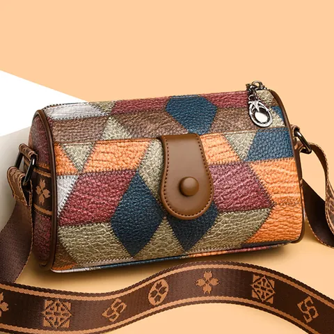 Vintage Damen Geometrisches Patchwork Zylindrische Umhängetasche Lychee-Textur PU-Leder Crossbody Tasche Mit Breitem Blumengurt