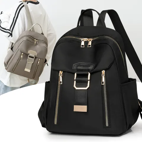Trendy Lichtgewicht Waterdichte Nylon Rugzak Voor Dames Mode Grote Capaciteit Reizen School Laptoptas Met Gouden Details