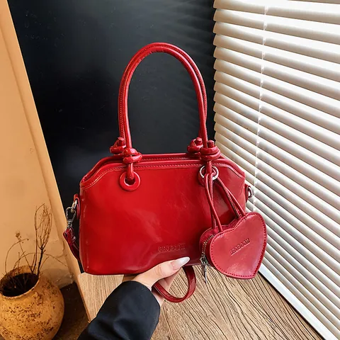 Borsa a Guscio in Pelle PU Moda Donna Con Ciondolo a Cuore Borsa a Tracolla Minimalista Versatile Borsa a Mano con Manico a Nodo