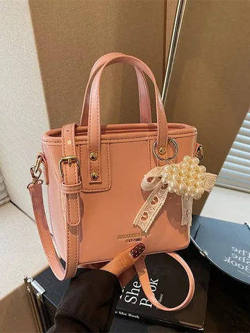 Women Minimalist PU Leather Bucket Bag Shiny Crossbody Handbag With Pearl Heart Lace Bowknot Pendant For Daily Work Travel