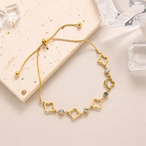 Women Fashion Titanium Steel Hollow Four Leaf Clover Bracelet Gold Plated Zirconia Adjustable Drawstring Chain Bracelet Elegant Jewelry Gift
