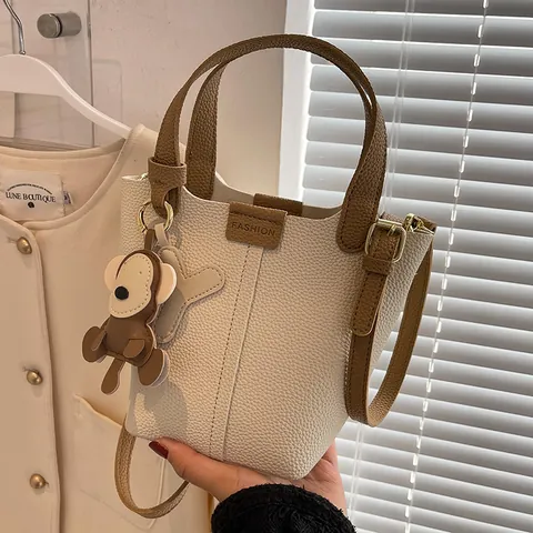 Dames Litchi-korrel PU Leren Emmer Tas Crossbody Handtas Binnenzak Dierlijke Hanger Retro Effen Kleur Schoudertas