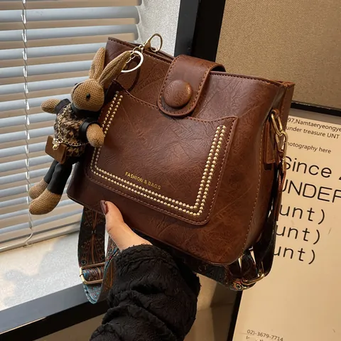 Women Vintage PU Leather Bucket Bag With Ethnic Wide Strap And Rabbit Pendant Fashion Crossbody Shoulder Bag