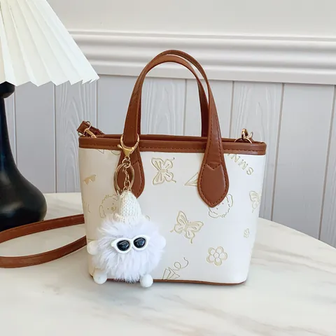 Women Fashion PU Leather Bucket Bag Large Capacity Cartoon Printed Embossed Shoulder Crossbody Bag With Plush Monster Charm