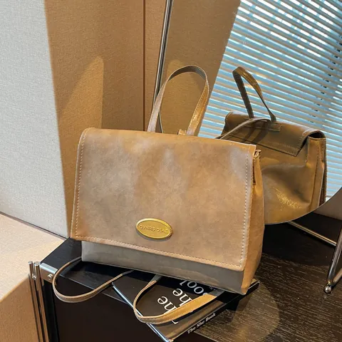 Vintage Korean Style PU Leather Backpack For Women Large Capacity Waterproof Commuting Handheld Bag With Gold Metal Plate