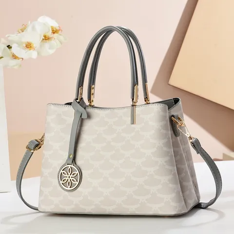 Women's Vintage PU Leather Handbag Contrast Color Geometric Pattern Crossbody Bag With Floral Pendant Structured Tote Bag