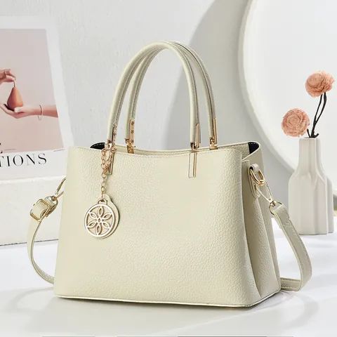 Women's Vintage PU Leather Handbag Contrast Color Geometric Pattern Crossbody Bag With Floral Pendant Structured Tote Bag
