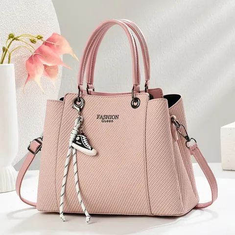 Damen Fashion Queen Gewebte Textur Handtasche Mit Mini Sneaker Anhänger PU Leder Tote Umhängetasche Für Den Alltag