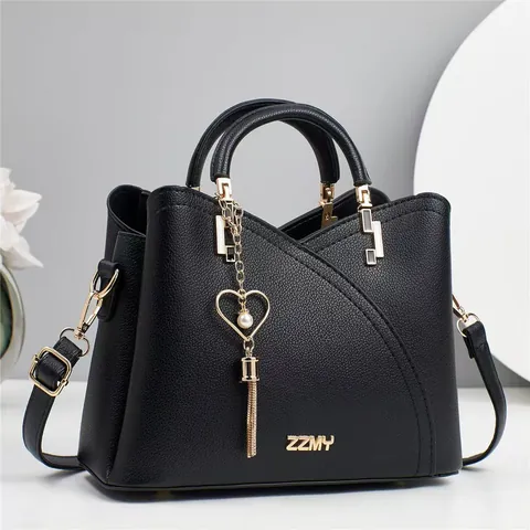 Borsa a Mano da Donna alla Moda in Pelle PU Elegante Borsa a Secchiello Con Ciondolo a Cuore Perla Artificial Tracolla Versatile per l'Uso Quotidiano