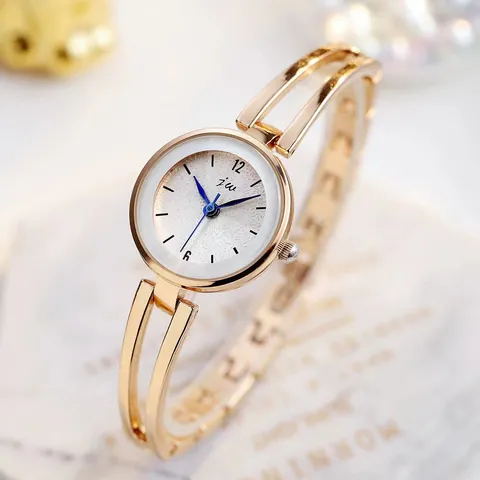 Women Fashion Hollow Bangle Watch Elegant Alloy Bracelet Quartz Wristwatch White Dial Blue Hands Minimalist Ladies Jewelry Watch
