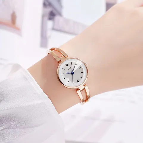 Women Fashion Hollow Bangle Watch Elegant Alloy Bracelet Quartz Wristwatch White Dial Blue Hands Minimalist Ladies Jewelry Watch