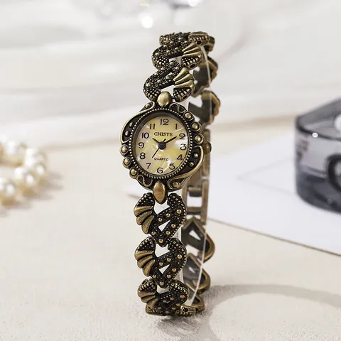 Vintage Damen Quarzuhr Armband Elegant Herz Hohl Geschnitzt Legierung Armband Minimalistisch Gold Bronze Ton Analoge Armbanduhr Für Damen