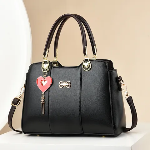Borsa a Mano da Donna alla Moda Grande Capacità in Pelle PU Borsa a Tracolla Con Pendaglio a Cuore Fibbia a Farfalla