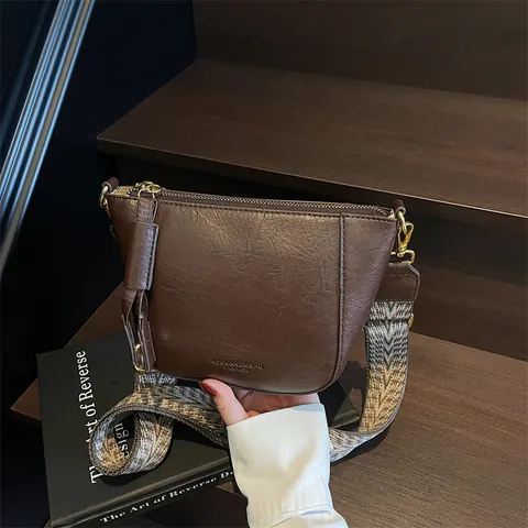 Women Vintage PU Leather Crossbody Bag Large Capacity Saddle Shoulder Bag With Wide Geometric Pattern Woven Strap Daily