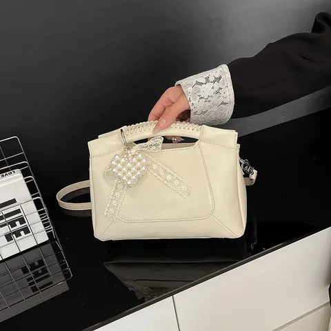 Korean Style Women PU Leather Bucket Bag Fashion Bow Artificial Pearl Heart Pendant Handbag Large Capacity Commute Shoulder Crossbody Bag