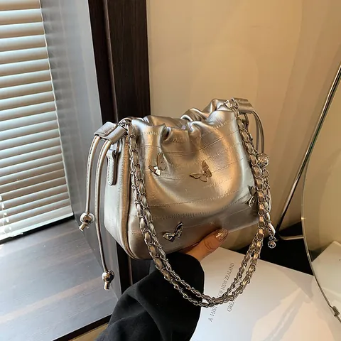 Women Fashion Butterfly Metal Decor Drawstring Bucket Bag Metallic PU Leather Chain Strap Shoulder Crossbody Bag