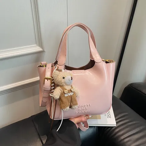 Vintage PU Leather Bucket Bag For Women Urban Minimalist Shoulder Crossbody Bag With Plush Bear Charm Solid Color Handbag