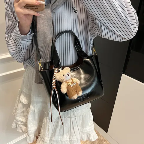Vintage PU Leather Bucket Bag For Women Urban Minimalist Shoulder Crossbody Bag With Plush Bear Charm Solid Color Handbag