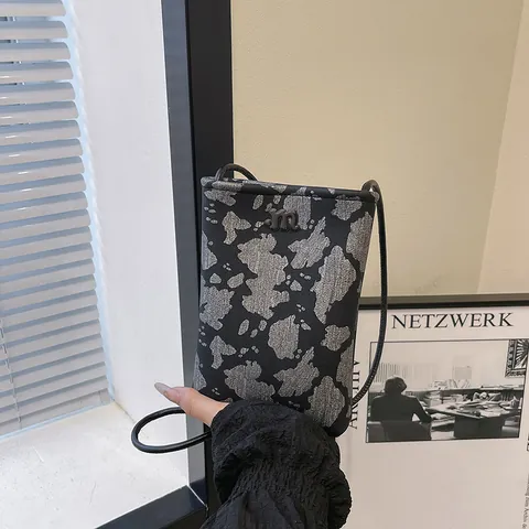 Women Fashion Cow Print Phone Bag PU Leather Crossbody Small Bag With Rope Strap And Plush Monster Charm For Daily