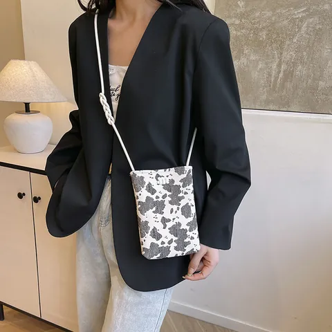 Women Fashion Cow Print Phone Bag PU Leather Crossbody Small Bag With Rope Strap And Plush Monster Charm For Daily