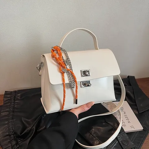 Minimalist Women PU Leather Crossbody Bag Solid Color Flip Flap Handbag With Orange Rope Charm Adjustable Strap Commuter Shoulder Bag