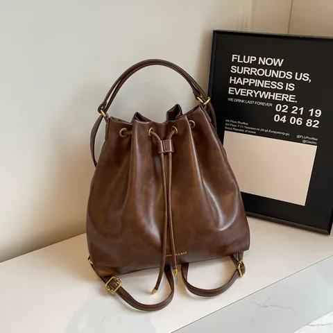 Sac à Dos Seau en Cuir PU Vintage pour Femmes Grande Capacité Sac à Bandoulière Polyvalent Style Coréen Sac de Voyage