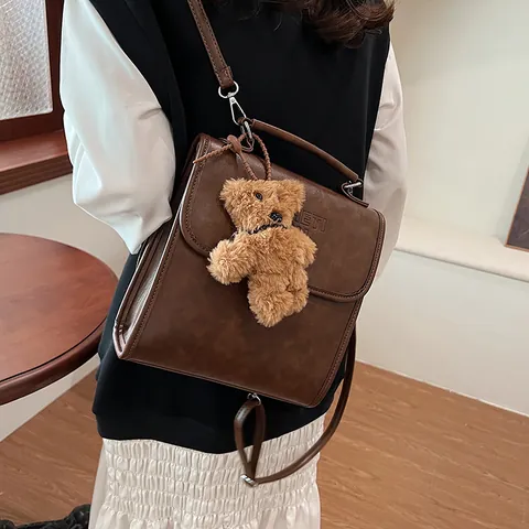 Zaino da Donna in Pelle PU Vintage Grande Capacità 2024 Nuova Borsa da Scuola Casual Con Ciondolo a Orsetto Borsa a Tracolla a Mano