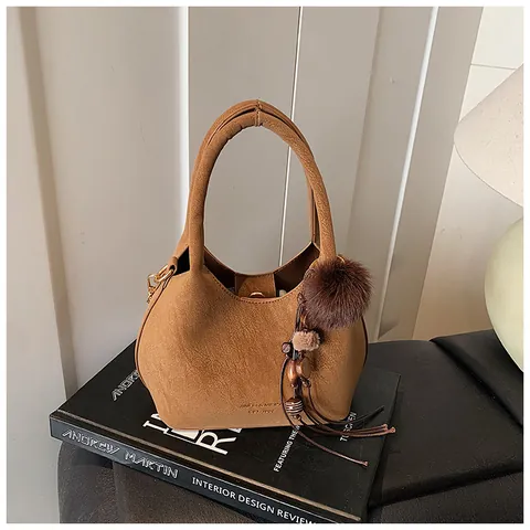 Borsa a Secchiello in Pelle PU Vintage per Donna Borsa a Tracolla con Texture Scamosciata Con Ciondolo a Pompon e Nappina Catena in Metallo