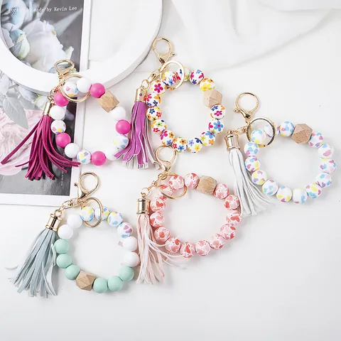 Portachiavi a Bracciale in Perline di Silicone Con Perla in Legno Nappa in Pelle Anello in Metallo Oro Donna